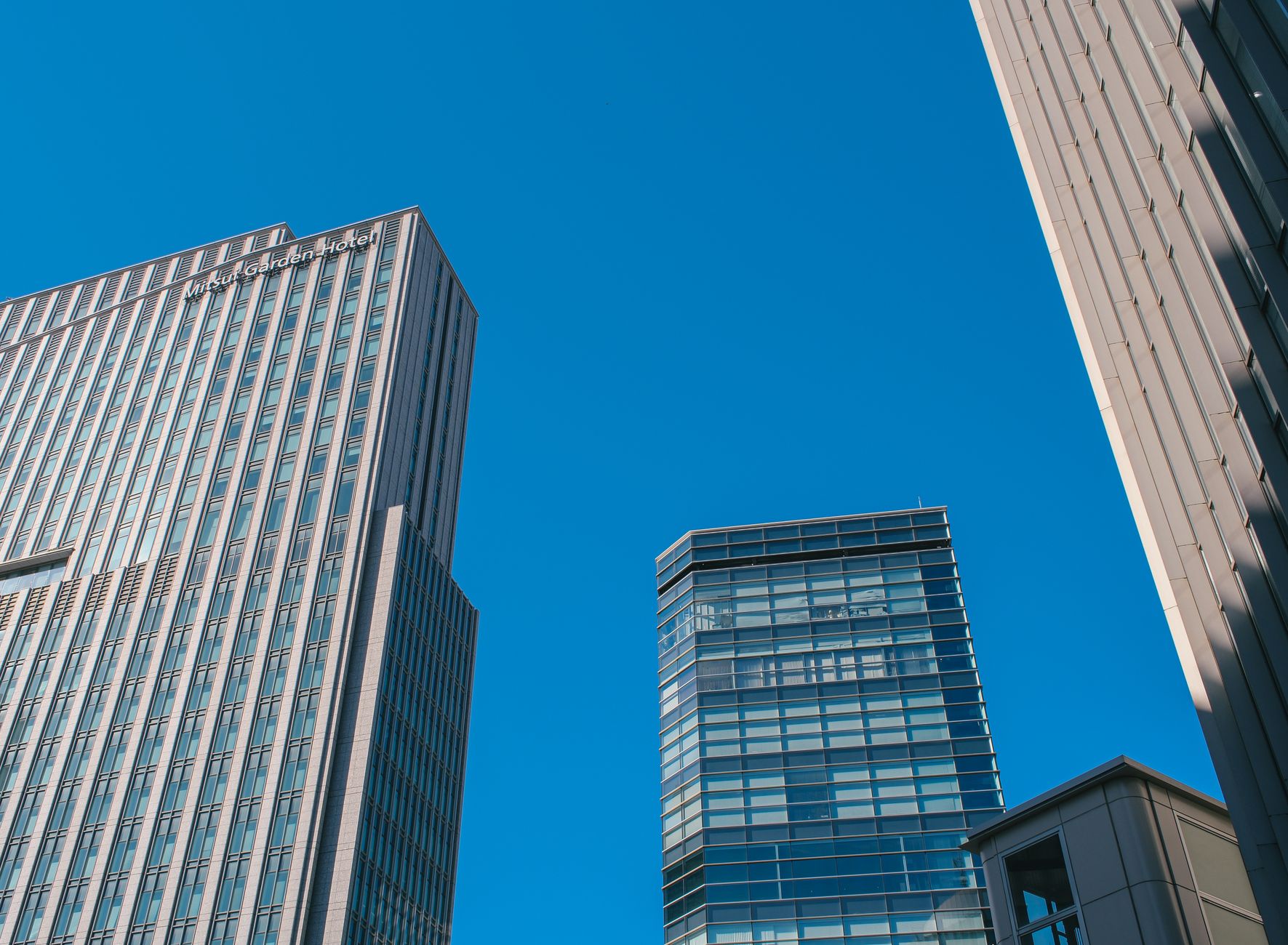 modern skyscrapers against clear blue sky