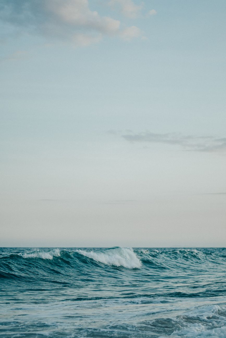 photograph of a body of water with waves