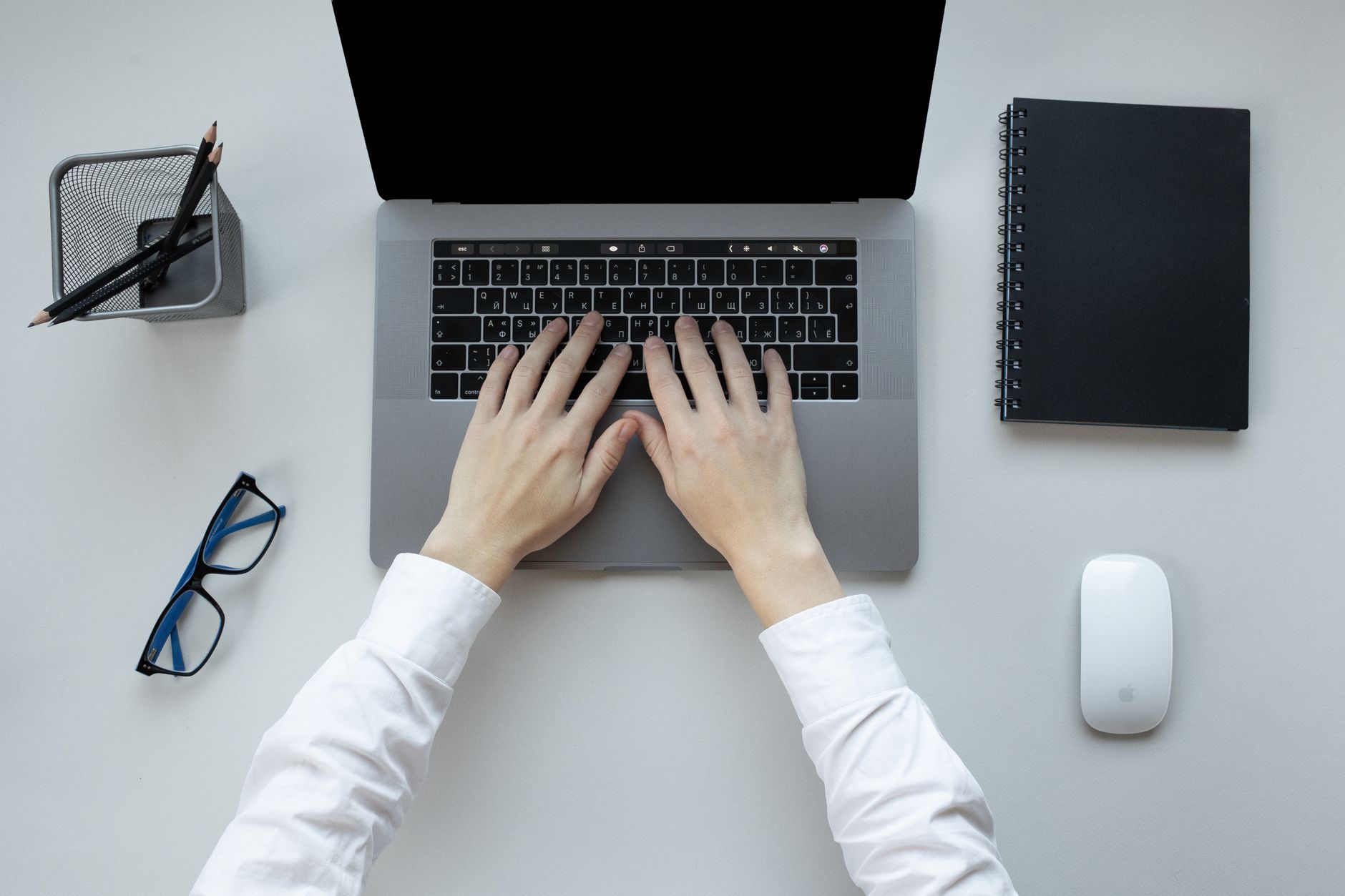 top view of a man using laptop